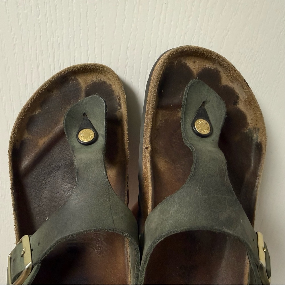 Well worn Birkenstock Gizeh Nubuck Leather in Thyme size 42